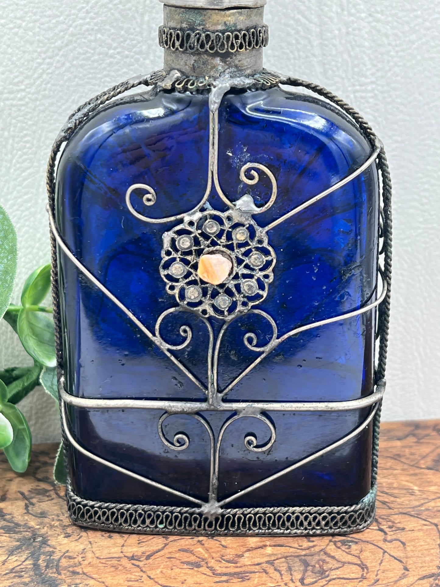 Blue Glass Perfume Bottle with Ornate Silver Design